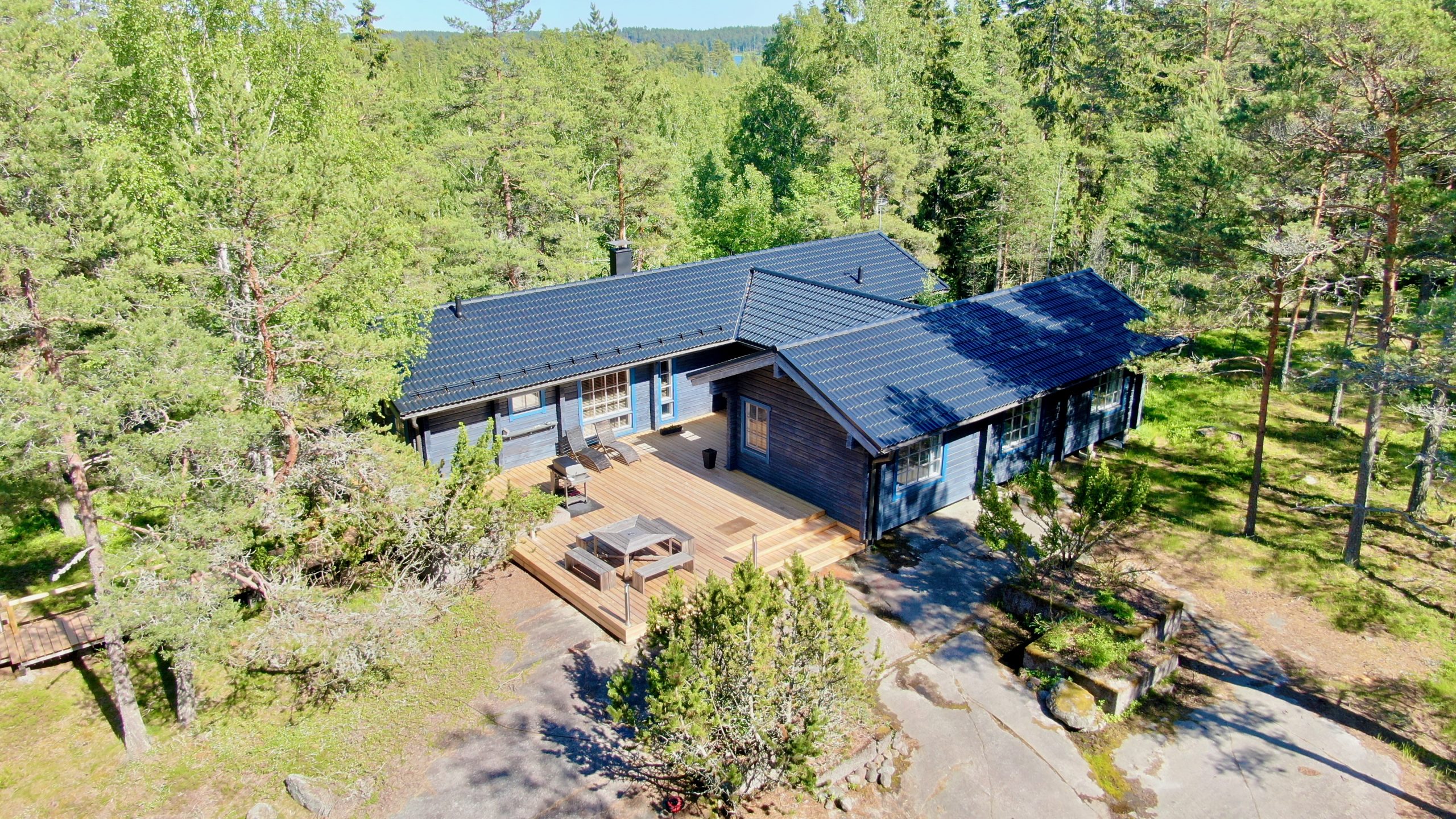Villa Mustikka surrounded by forest at Villa Långstrand in Southern Finland
