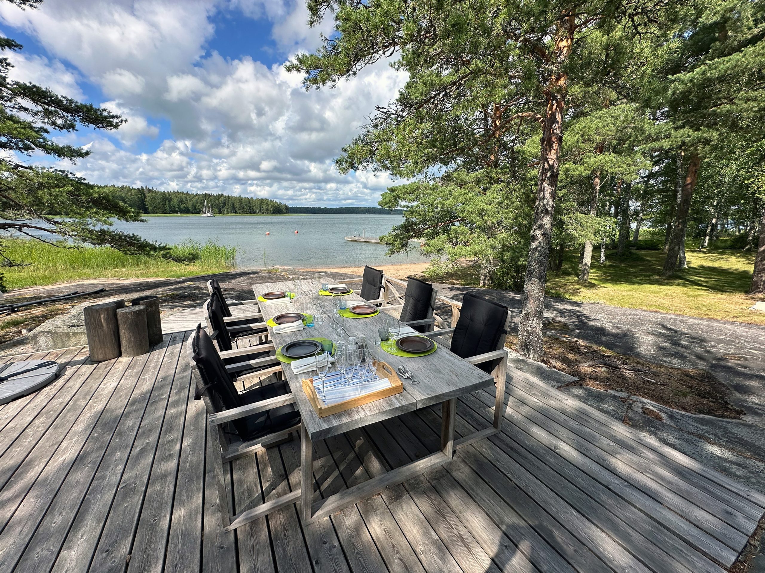 Private terrace dining setup overlooking the sea in the Finnish Archipelago